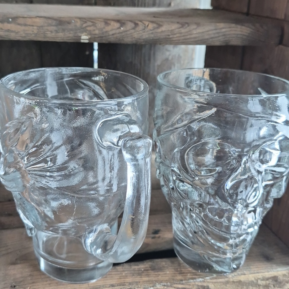 A Pair of 32 oz Luminarc pirate skull themed beer glasses